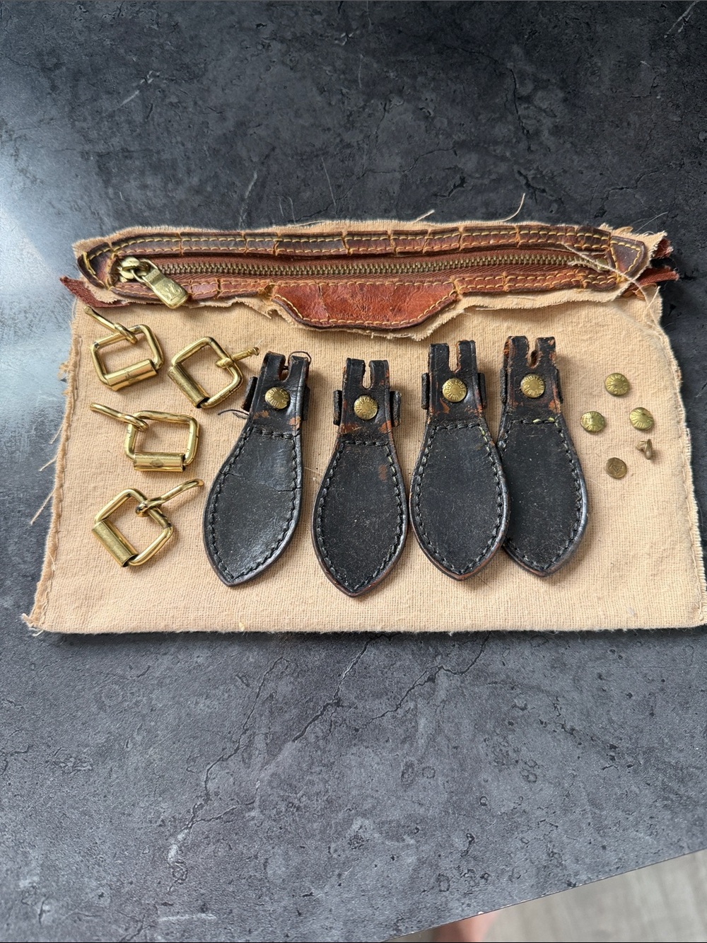 Authentic LV Louis Vuitton hardware and inside pocket of dry rotted bucket purse